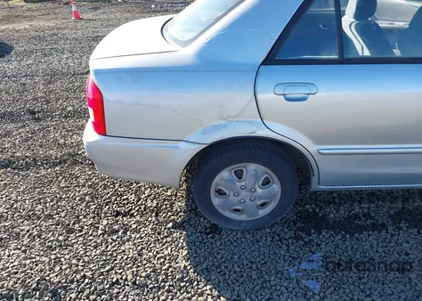 2000 Mazda Protege Dx/Lx z USA, uszkodzony, nr VIN JM1BJ2225Y0211691